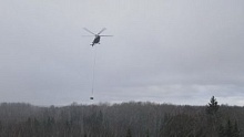 Три десятка рейсов, почти 35 т груза: авиация МЧС помогает восстанавливать мемориал партизанскому отряду «Славный»